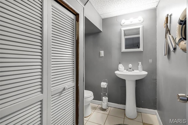 1326 Petite Dr, Saint Louis, MO 63138 - half bathroom with tile patterned flooring and a closet
