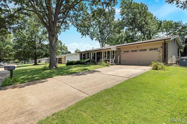 1326 Petite Dr, Saint Louis, MO 63138 - ranch-style home featuring an attached garage, driveway, a front yard, and brick siding