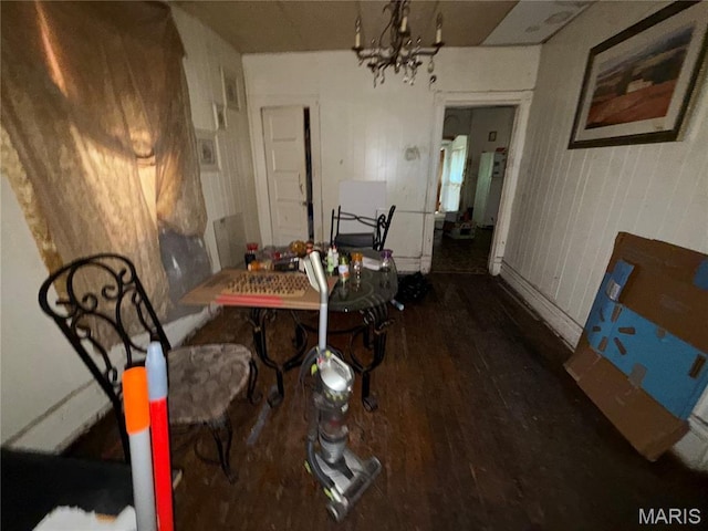 2806 Union Blvd, Saint Louis, MO 63115 - dining area with wood finished floors and a chandelier