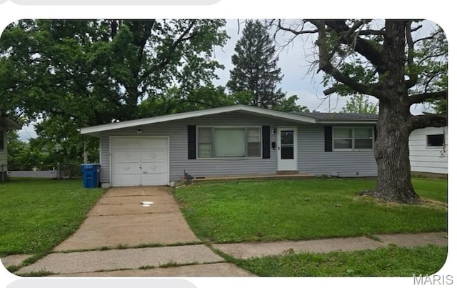 9115 Clarion Dr, Saint Louis, MO 63136 - ranch-style house featuring driveway, a garage, and a front yard