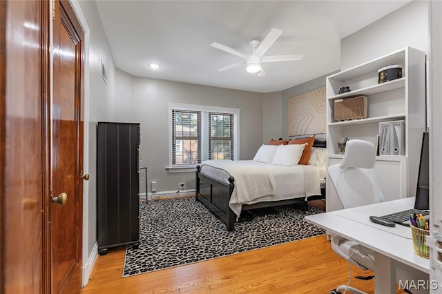 7801 Delmar Blvd Unit 2W, University City, MO 63130 - bedroom featuring light wood-style flooring and baseboards