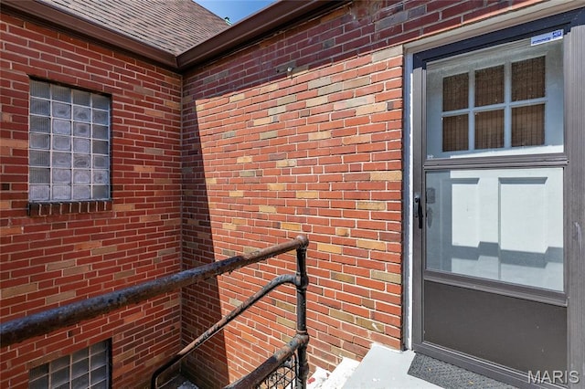 7801 Delmar Blvd Unit 2W, University City, MO 63130 - view of exterior entry featuring brick siding