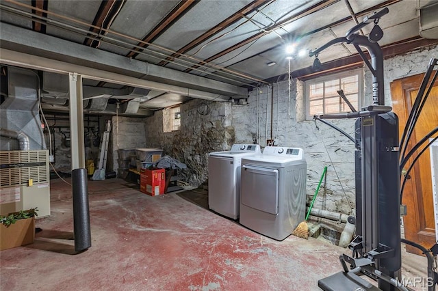 7801 Delmar Blvd Unit 2W, University City, MO 63130 - basement featuring washing machine and dryer and heating unit