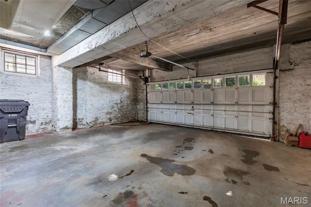 7801 Delmar Blvd Unit 2W, University City, MO 63130 - garage featuring a garage door opener