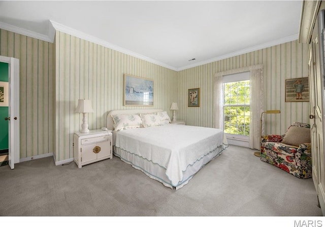 10 Jefferson Rd Unit 3A, Webster Groves, MO 63119 - bedroom with ornamental molding, wallpapered walls, and light colored carpet