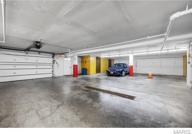 10 Jefferson Rd Unit 3A, Webster Groves, MO 63119 - parking garage with a garage door opener
