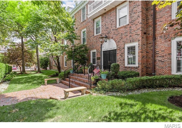 10 Jefferson Rd Unit 3A, Webster Groves, MO 63119 - view of front facade with a front lawn and brick siding
