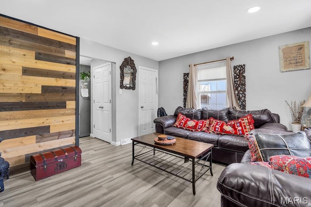 3711 Ashby Rd, Saint Ann, MO 63074 - living room with light wood-style floors and recessed lighting
