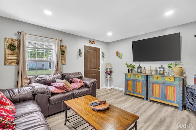 3711 Ashby Rd, Saint Ann, MO 63074 - living room with light wood-style flooring and recessed lighting