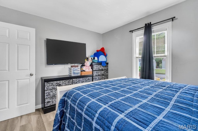 3711 Ashby Rd, Saint Ann, MO 63074 - bedroom with wood finished floors and baseboards