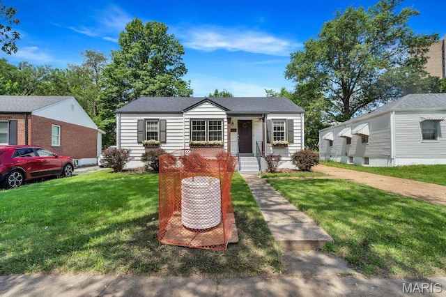 3711 Ashby Rd, Saint Ann, MO 63074 - view of front of house featuring a front yard