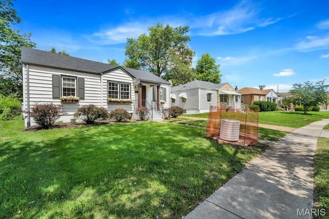 3711 Ashby Rd, Saint Ann, MO 63074 - view of front of property featuring a front lawn and a residential view
