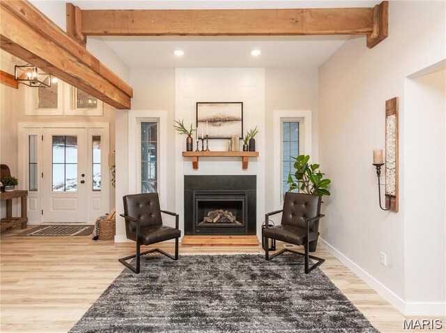 24925 State Route Mm, Farmington, MO 63640 - sitting room with light wood-style floors, recessed lighting, a large fireplace, beamed ceiling, and a chandelier
