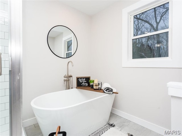 24925 State Route Mm, Farmington, MO 63640 - full bathroom with a soaking tub and marble finish flooring