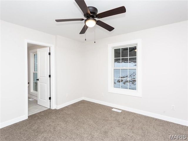 24925 State Route Mm, Farmington, MO 63640 - carpeted spare room featuring baseboards and a ceiling fan