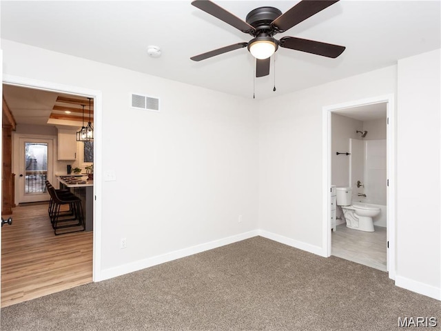 24925 State Route Mm, Farmington, MO 63640 - spare room featuring carpet floors, a ceiling fan, and a smoke detector