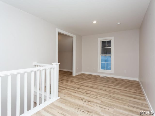 24925 State Route Mm, Farmington, MO 63640 - empty room featuring light wood-style flooring and recessed lighting