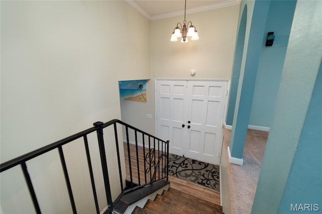 1340 Central Pkwy, Florissant, MO 63031 - entrance foyer with ornamental molding, a chandelier, and wood finished floors
