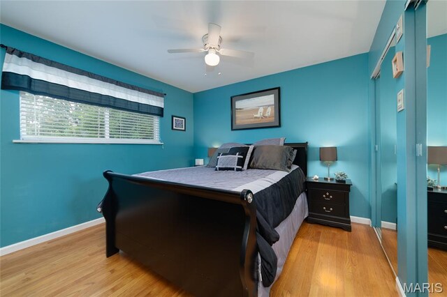 1340 Central Pkwy, Florissant, MO 63031 - bedroom with light wood-style floors and a ceiling fan