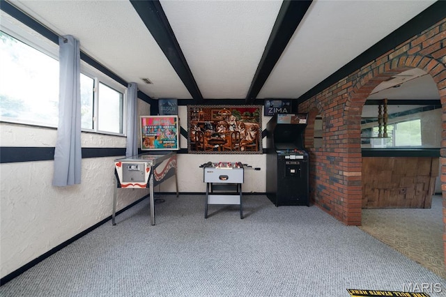 1340 Central Pkwy, Florissant, MO 63031 - playroom with carpet flooring, arched walkways, and a textured wall