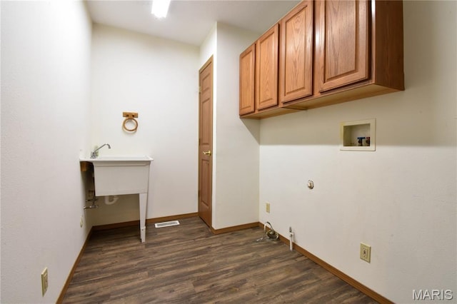 408 Marty Graten Ct, Hamel, IL 62046 - laundry room featuring hookup for a washing machine, cabinet space, dark wood-style flooring, and gas dryer hookup