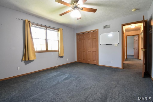 408 Marty Graten Ct, Hamel, IL 62046 - unfurnished bedroom featuring carpet floors, a closet, a textured ceiling, and ceiling fan