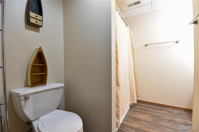 408 Marty Graten Ct, Hamel, IL 62046 - full bathroom featuring wood finished floors, curtained shower, and a paneled ceiling