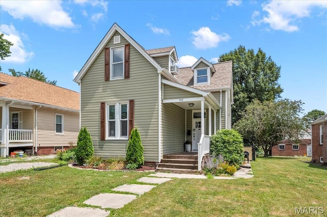 503 Wabash Ave, Belleville, IL 62220 - view of front of house with a front yard and roof with shingles