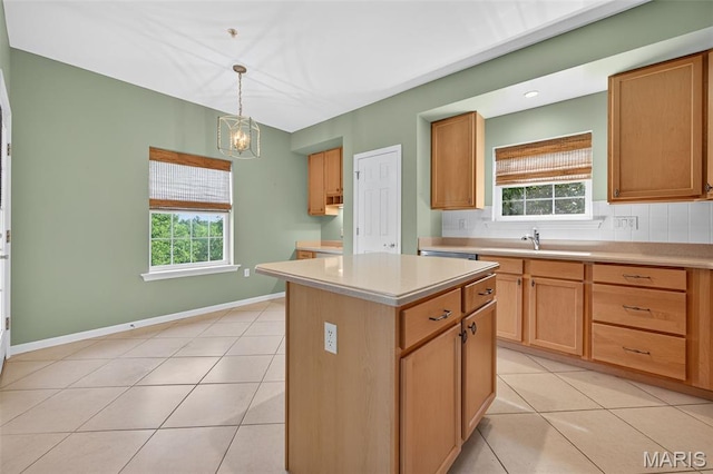 5 Monarch Trace Ct Unit 305, Chesterfield, MO 63017 - kitchen with light tile patterned flooring, light countertops, a chandelier, a center island, and pendant lighting