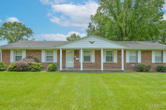 318 W Oak St, Mascoutah, IL 62258 - single story home with brick siding, a front lawn, and a porch