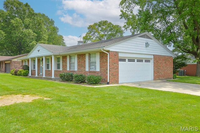 318 W Oak St, Mascoutah, IL 62258 - ranch-style house with a garage, a front lawn, and brick siding
