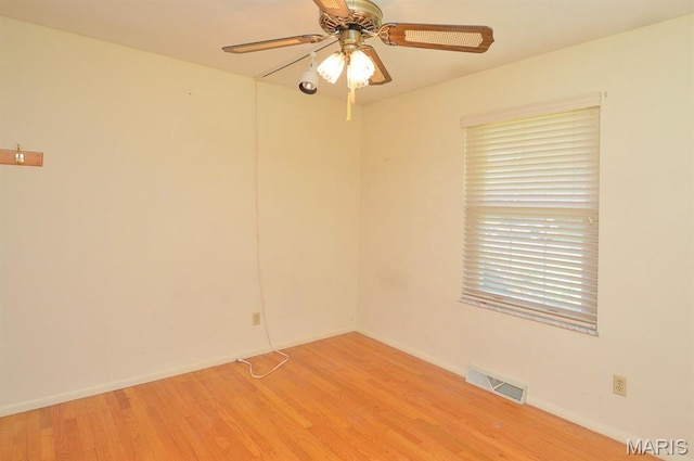 318 W Oak St, Mascoutah, IL 62258 - empty room featuring light wood finished floors and a ceiling fan