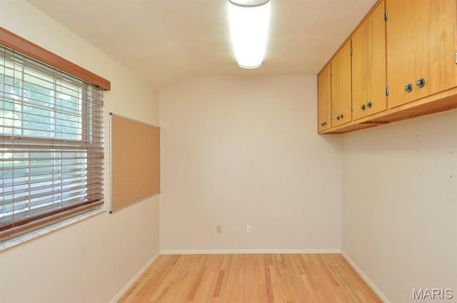 318 W Oak St, Mascoutah, IL 62258 - empty room featuring light wood-style floors and lofted ceiling