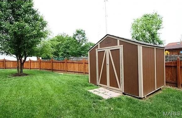 2763 Cascade Lake Dr, Belleville, IL 62221 - view of shed with a fenced backyard