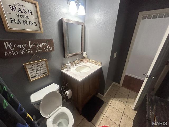 2763 Cascade Lake Dr, Belleville, IL 62221 - bathroom with vanity and tile patterned floors