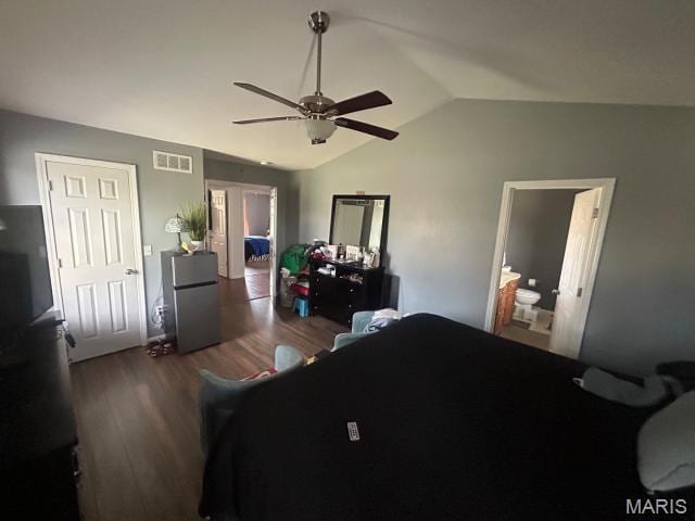 2763 Cascade Lake Dr, Belleville, IL 62221 - bedroom featuring freestanding refrigerator, wood finished floors, lofted ceiling, and ceiling fan