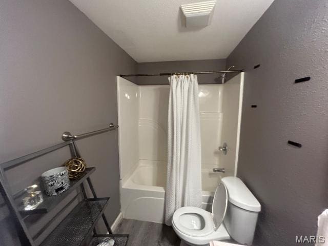 2763 Cascade Lake Dr, Belleville, IL 62221 - bathroom with wood finished floors and shower / tub combo