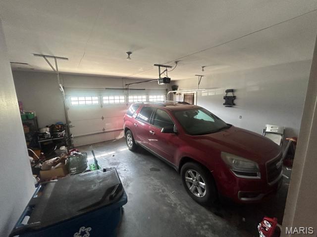2763 Cascade Lake Dr, Belleville, IL 62221 - garage with a garage door opener