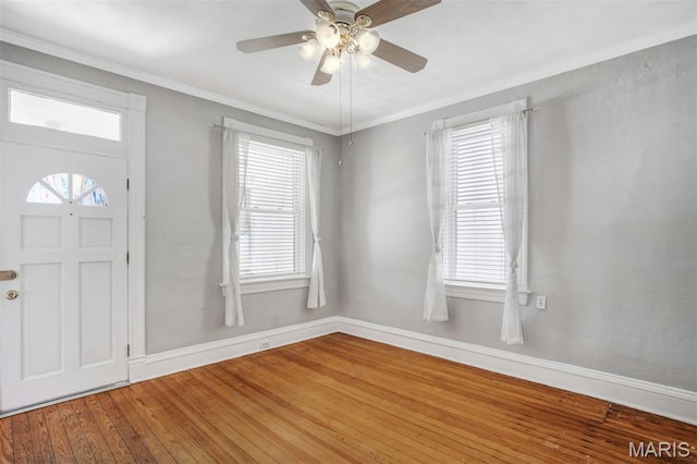 2617 Sutton Blvd, Maplewood, MO 63143 - entrance foyer featuring hardwood / wood-style flooring, plenty of natural light, ceiling fan, and crown molding