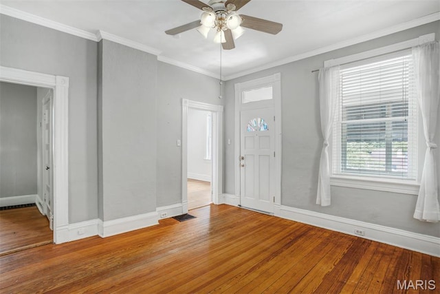 2617 Sutton Blvd, Maplewood, MO 63143 - entryway with wood-type flooring, healthy amount of natural light, a ceiling fan, and ornamental molding