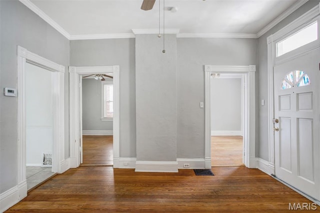 2617 Sutton Blvd, Maplewood, MO 63143 - entrance foyer featuring a ceiling fan, wood finished floors, and ornamental molding