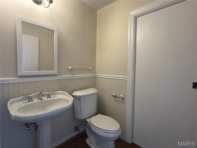 17300 W Bridle Trl, Wildwood, MO 63038 - bathroom with wainscoting and wood finished floors