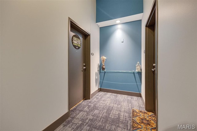 4100 Forest Park Ave Unit 306, Saint Louis, MO 63108 - hallway with dark colored carpet and recessed lighting
