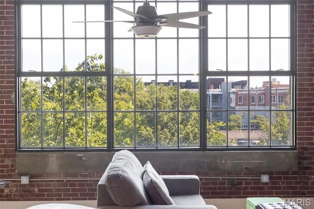 4100 Forest Park Ave Unit 306, Saint Louis, MO 63108 - detailed view of a ceiling fan and brick wall