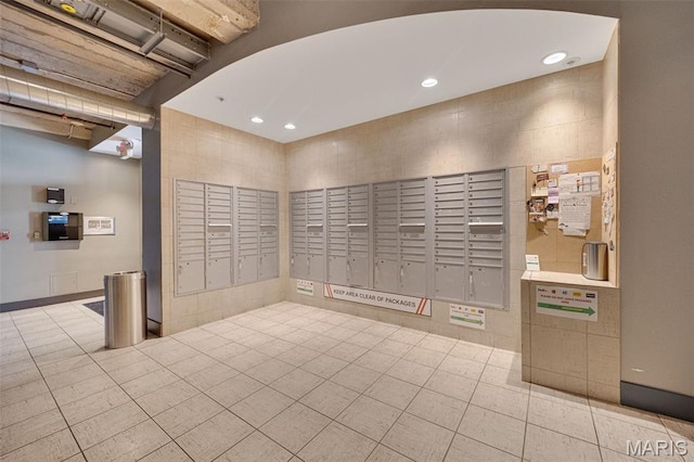 4100 Forest Park Ave Unit 306, Saint Louis, MO 63108 - view of home's community with recessed lighting, mail area, and a package area