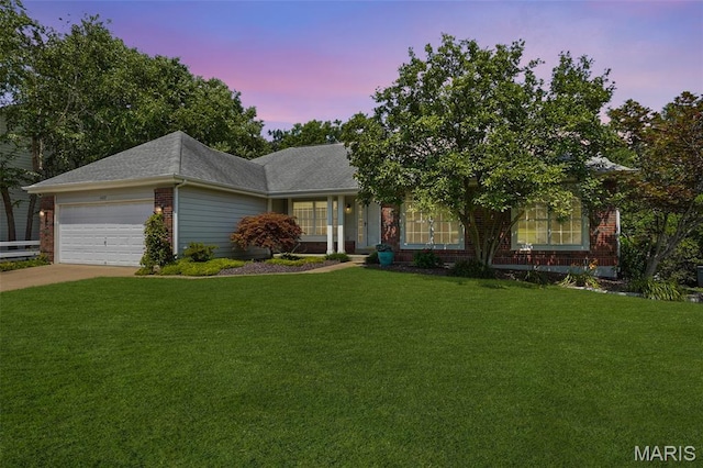1473 Crooked Stick Dr, Ofallon, MO 63366 - view of front of property featuring brick siding, a garage, a lawn, and concrete driveway