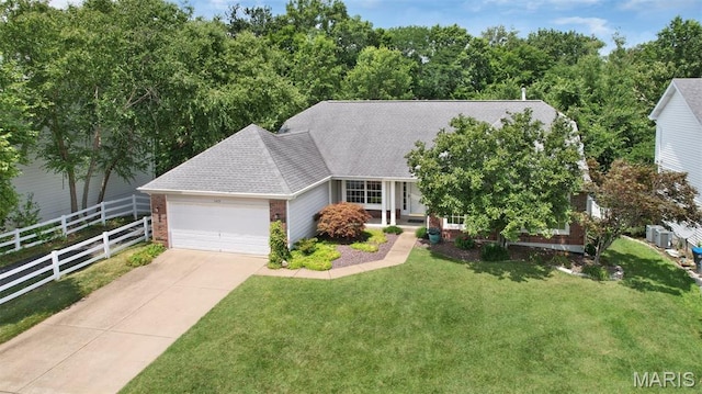 1473 Crooked Stick Dr, Ofallon, MO 63366 - view of front facade with brick siding, an attached garage, concrete driveway, and roof with shingles