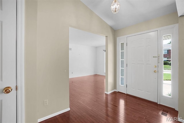 1473 Crooked Stick Dr, Ofallon, MO 63366 - entryway featuring lofted ceiling, healthy amount of natural light, and hardwood / wood-style flooring
