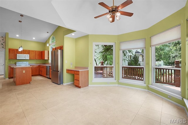 1473 Crooked Stick Dr, Ofallon, MO 63366 - kitchen featuring stainless steel appliances, plenty of natural light, a ceiling fan, a towering ceiling, and recessed lighting