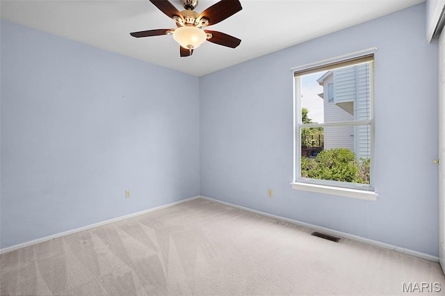 1473 Crooked Stick Dr, Ofallon, MO 63366 - spare room featuring carpet flooring and ceiling fan